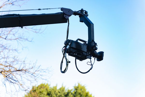 Camera crane with a professional film camera during an outdoor shoot – Miso Film case story at Corpital
